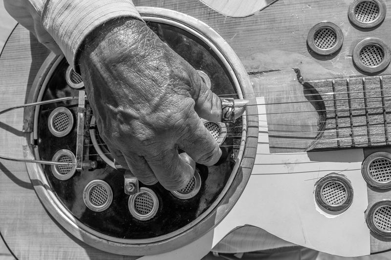 Close-up of a guitarist playing